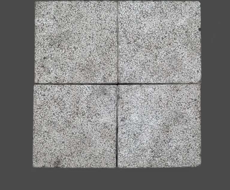 royal gray bushhammer tumbled.jpg